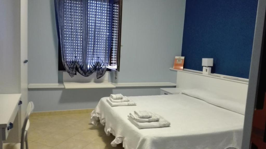 Postel nebo postele na pokoji v ubytování B&B Casa Mia