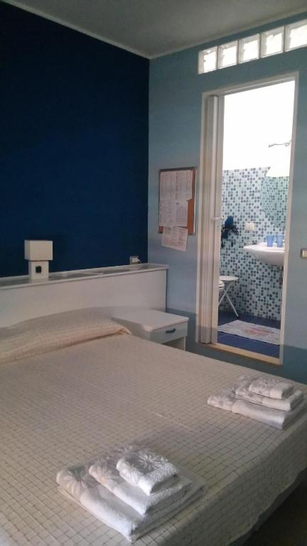 Postel nebo postele na pokoji v ubytování B&B Casa Mia