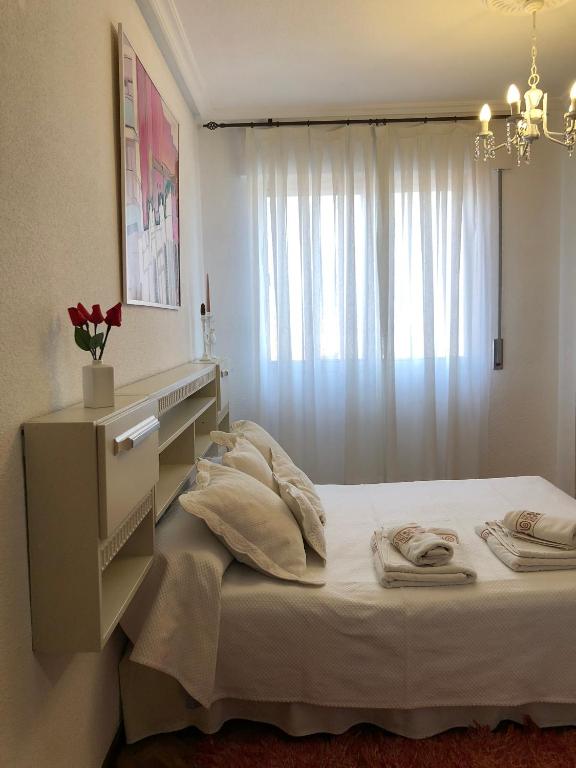 Postel nebo postele na pokoji v ubytování Piso Urbano Garcia De la Cruz