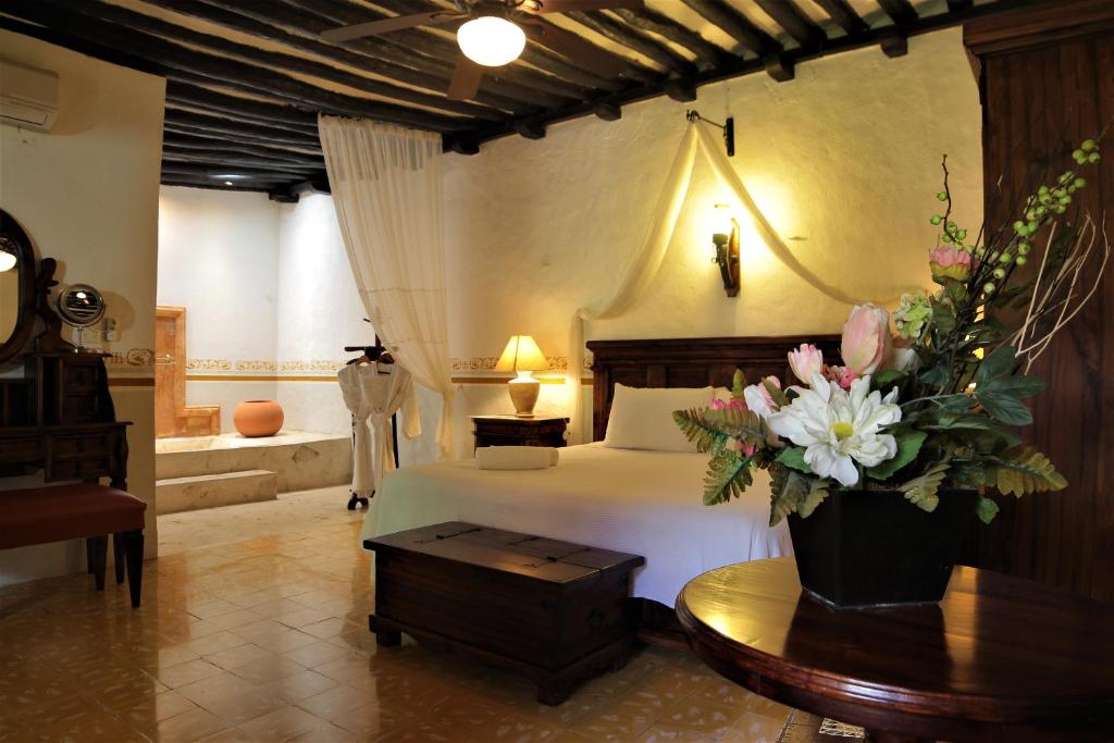 Uma cama ou camas num quarto em Casa Tia Micha