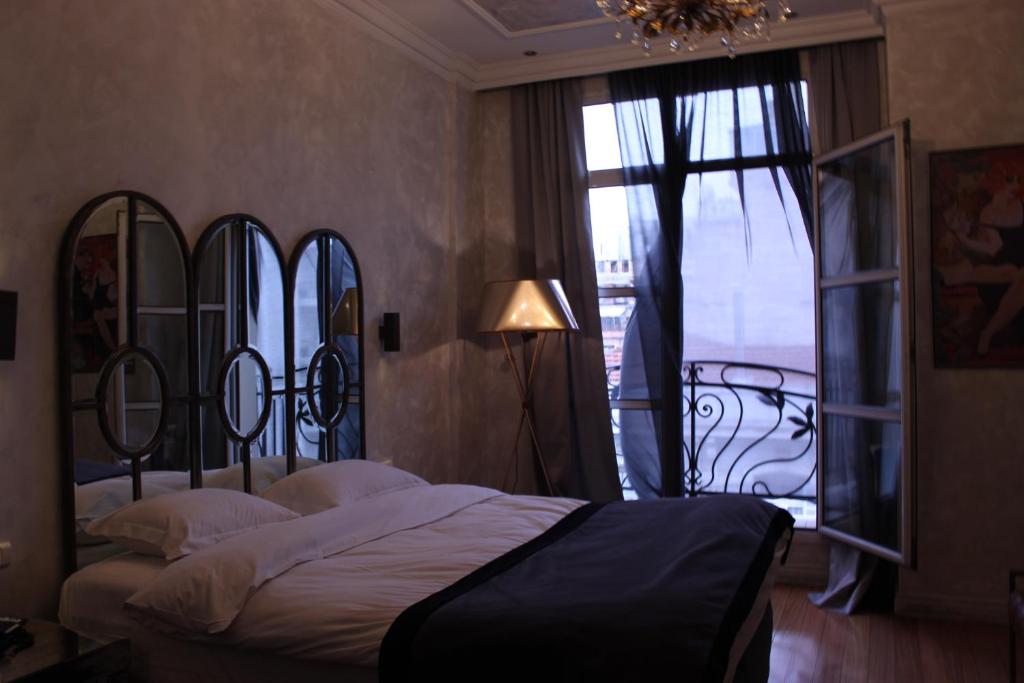 Letto o letti in una camera di Andromeda Hotel Thessaloniki