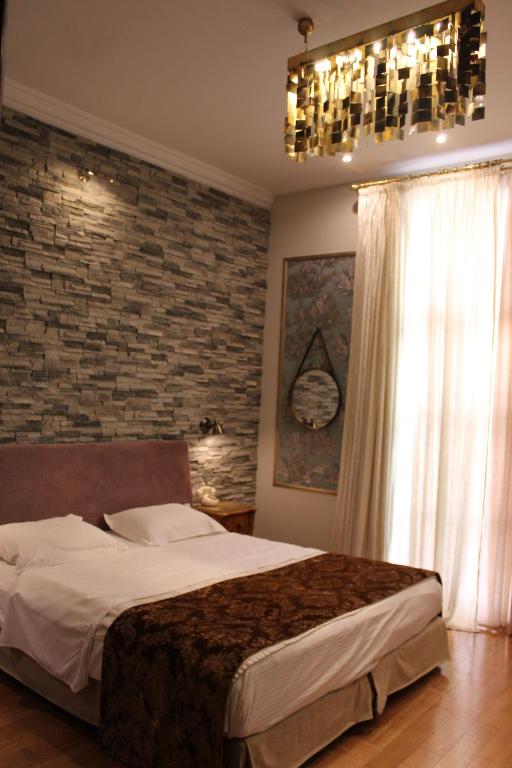 Letto o letti in una camera di Andromeda Hotel Thessaloniki