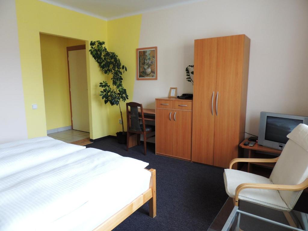 Postel nebo postele na pokoji v ubytování Penzion Pohoda Beroun