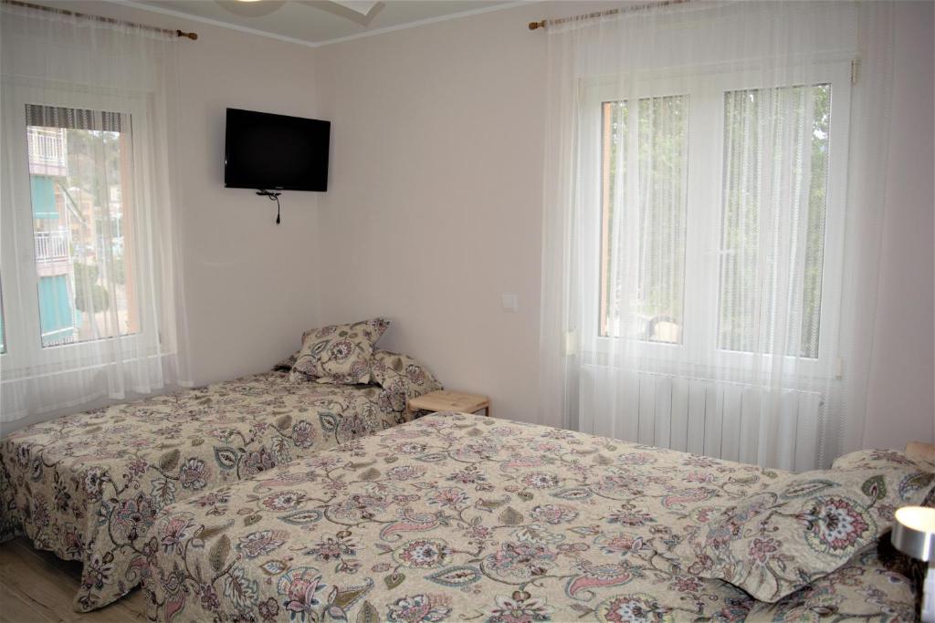 Postel nebo postele na pokoji v ubytování B&B LOS LLANOS