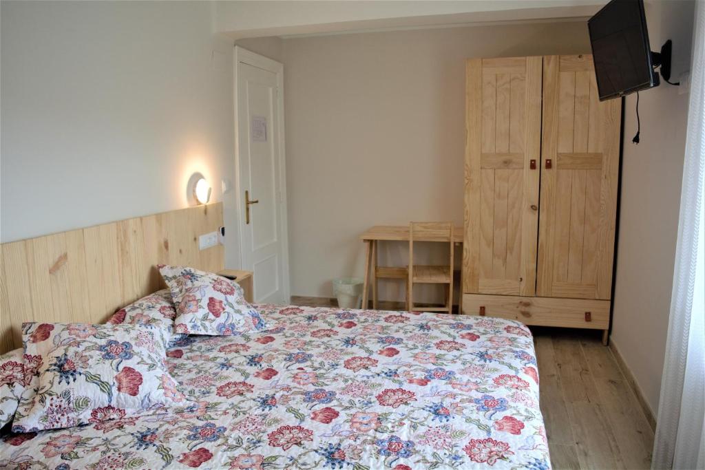 Postel nebo postele na pokoji v ubytování B&B LOS LLANOS