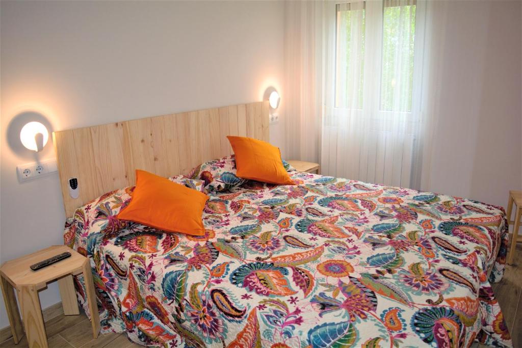 Postel nebo postele na pokoji v ubytování B&B LOS LLANOS