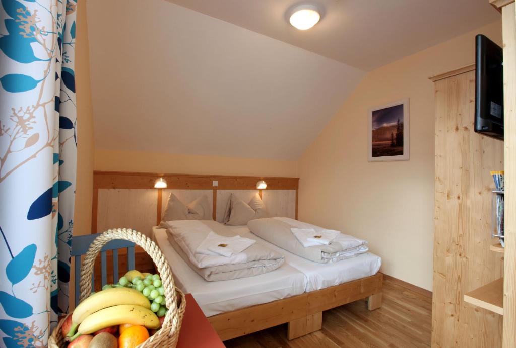 Postel nebo postele na pokoji v ubytování JUFA Hotel St Michael im Lungau