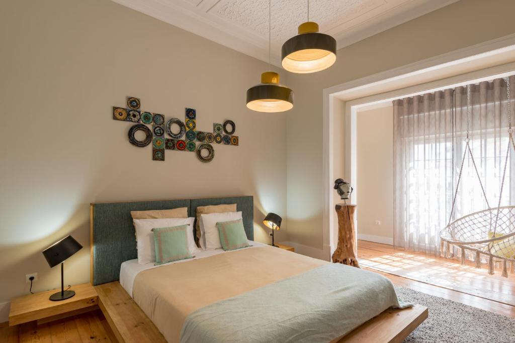 Llit o llits en una habitació de 19 Tile Ceramic Concept - by Unlock Hotels