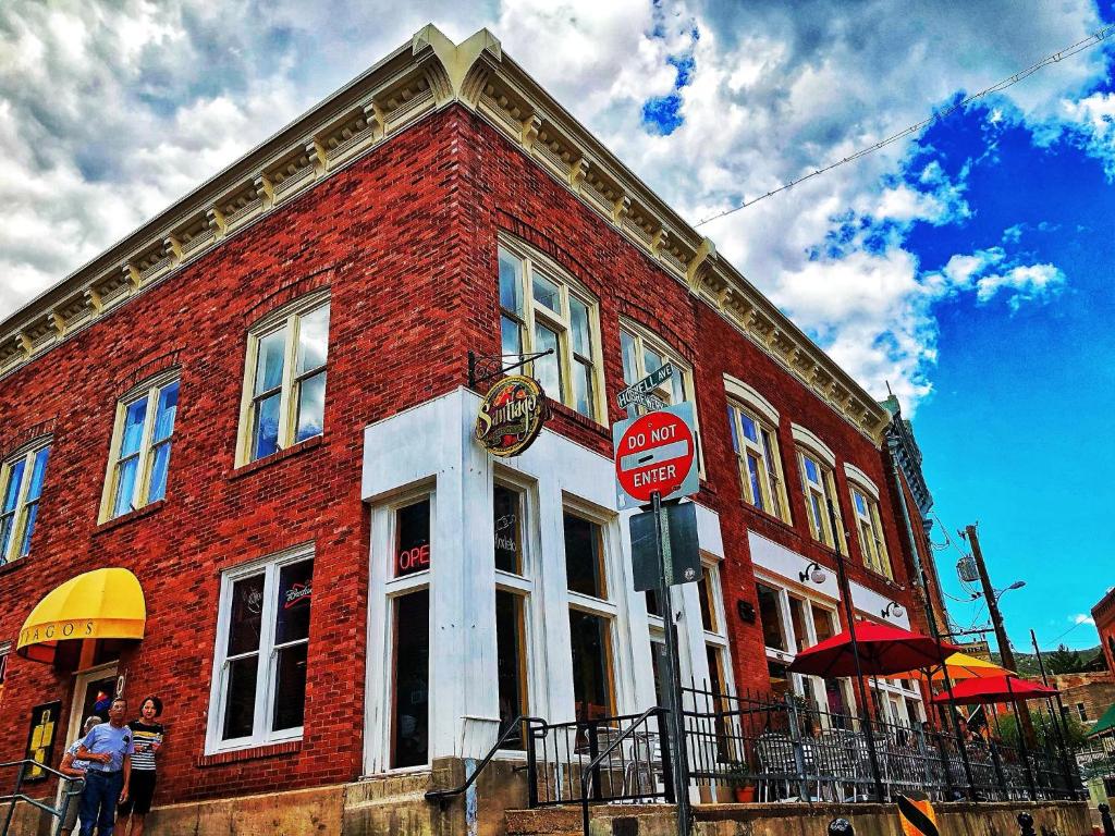 a red brick building with a do not enter sign at Hotel San Ramon in Bisbee