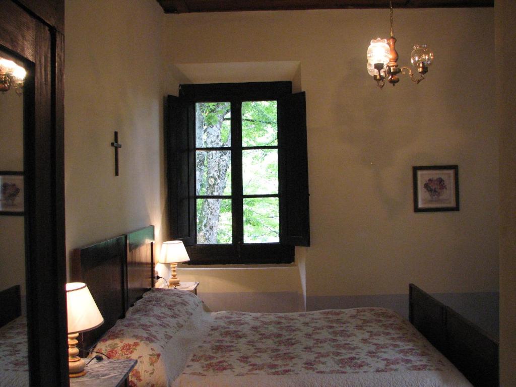 Posteľ alebo postele v izbe v ubytovaní Locanda Dei Baroni - Antica Dimora