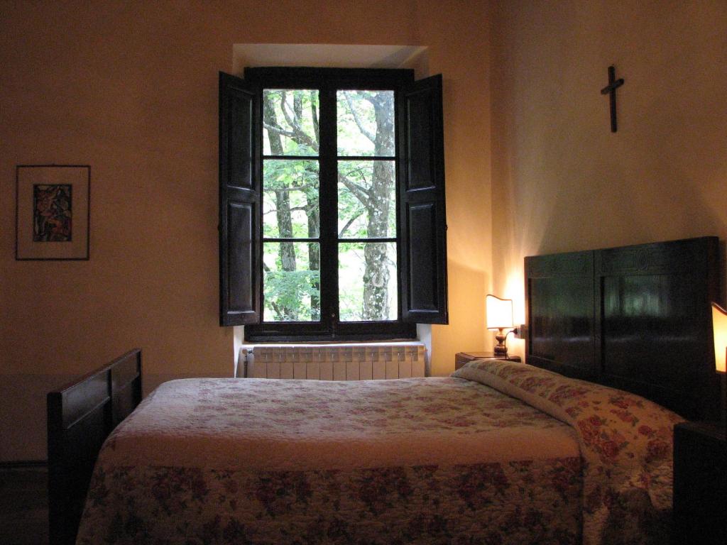 Posteľ alebo postele v izbe v ubytovaní Locanda Dei Baroni - Antica Dimora