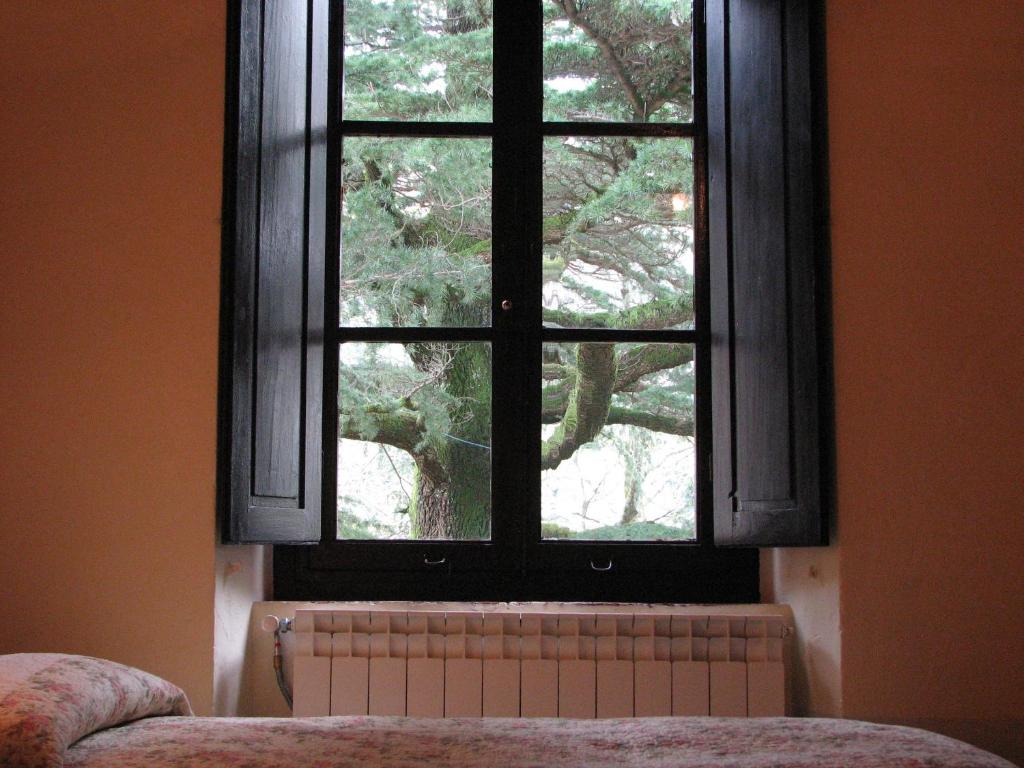 Posteľ alebo postele v izbe v ubytovaní Locanda Dei Baroni - Antica Dimora
