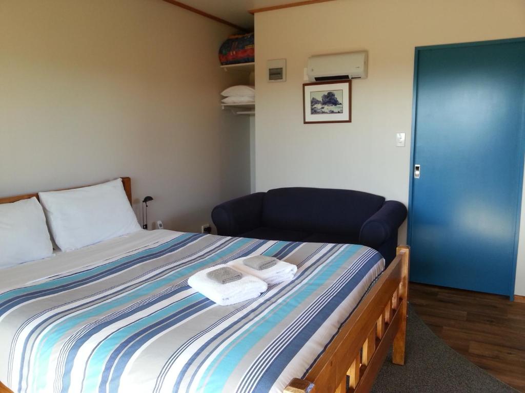 Postel nebo postele na pokoji v ubytování Shining Star Beachfront Accommodation