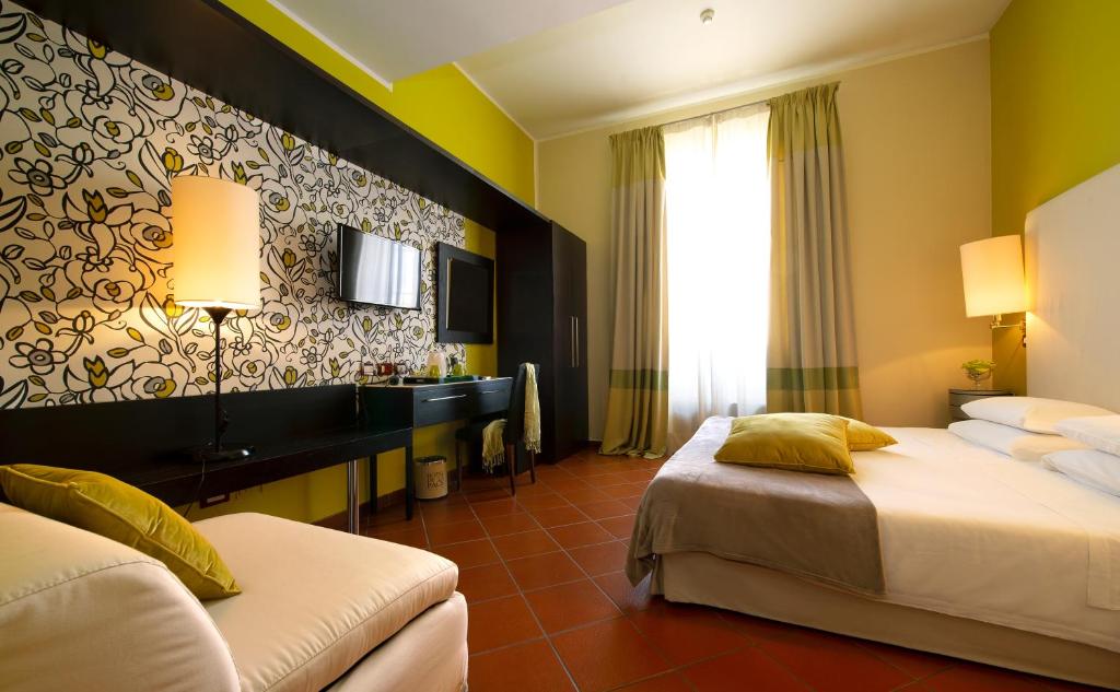 Posteľ alebo postele v izbe v ubytovaní Hotel De La Pace, Sure Hotel Collection by Best Western