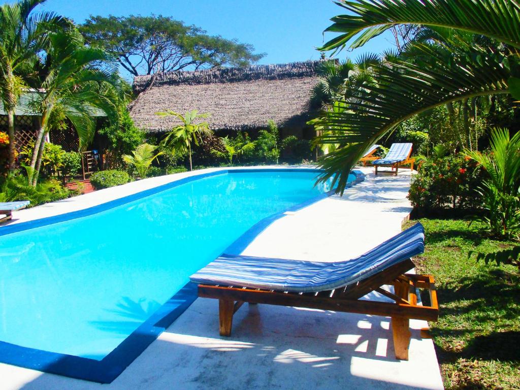 Bazén v ubytování Tropic Hôtel nebo v jeho okolí