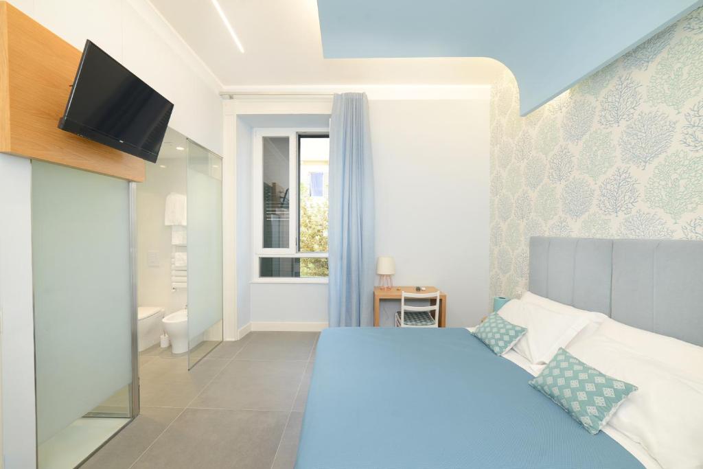 Posteľ alebo postele v izbe v ubytovaní In Centro B&B
