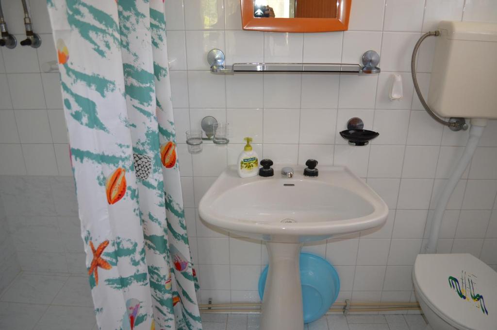 Koupelna v ubytování Apartments Alen