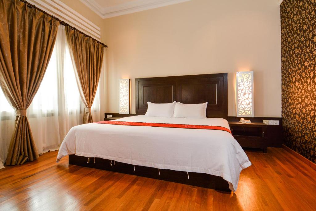 Postel nebo postele na pokoji v ubytování Jonker Boutique Hotel