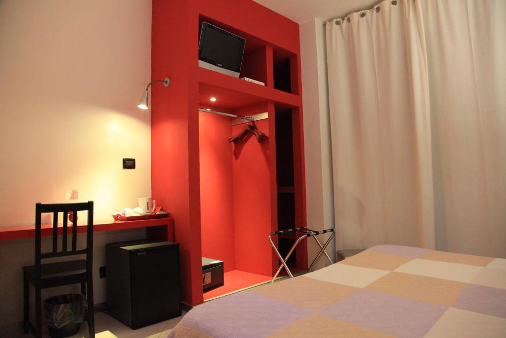 Postel nebo postele na pokoji v ubytování Bella Pescara B&B