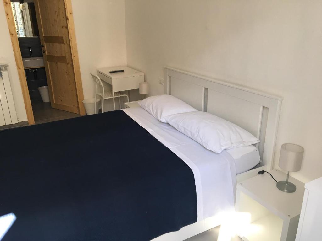 Posteľ alebo postele v izbe v ubytovaní FraLePorte