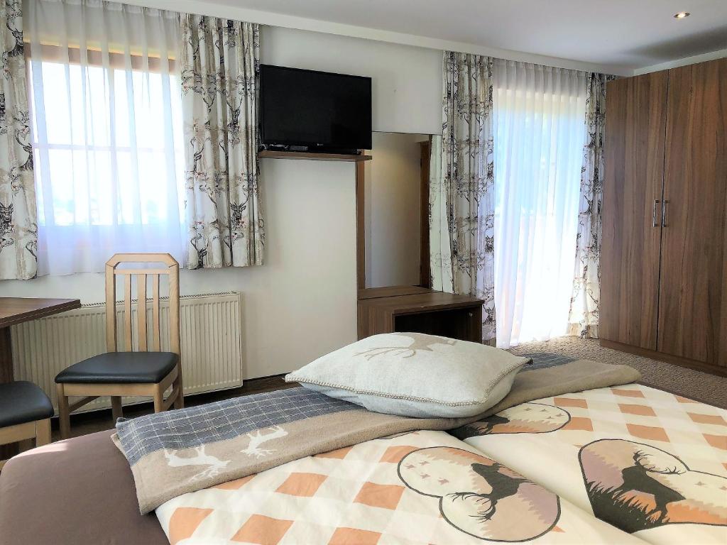 Posteľ alebo postele v izbe v ubytovaní Urlaub am Bauernhof Rothof
