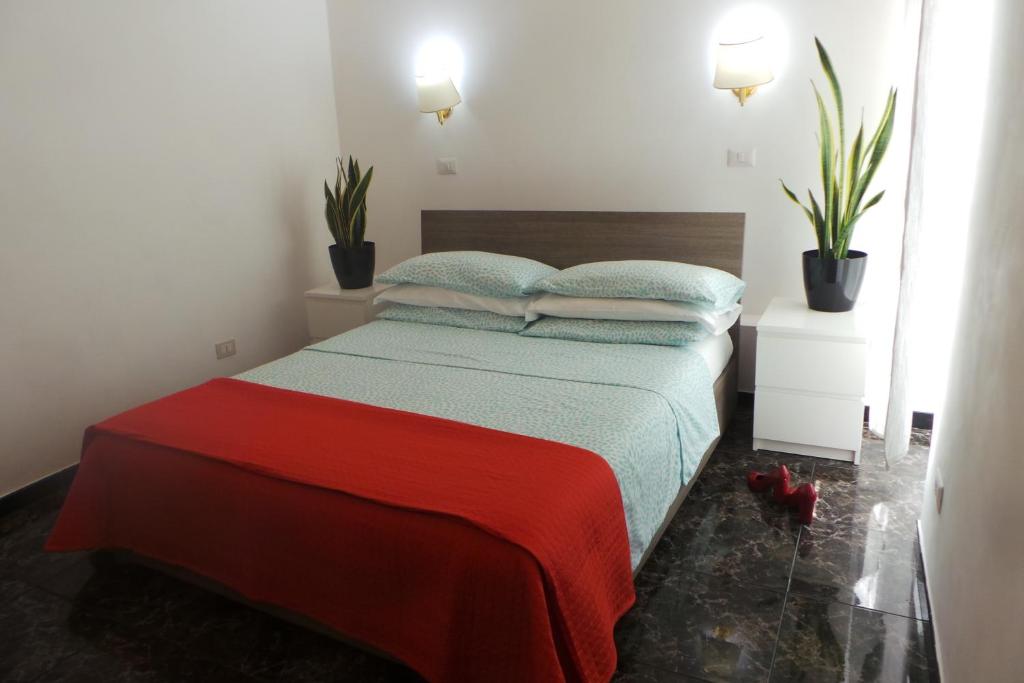Postel nebo postele na pokoji v ubytování Hotel Castelfidardo
