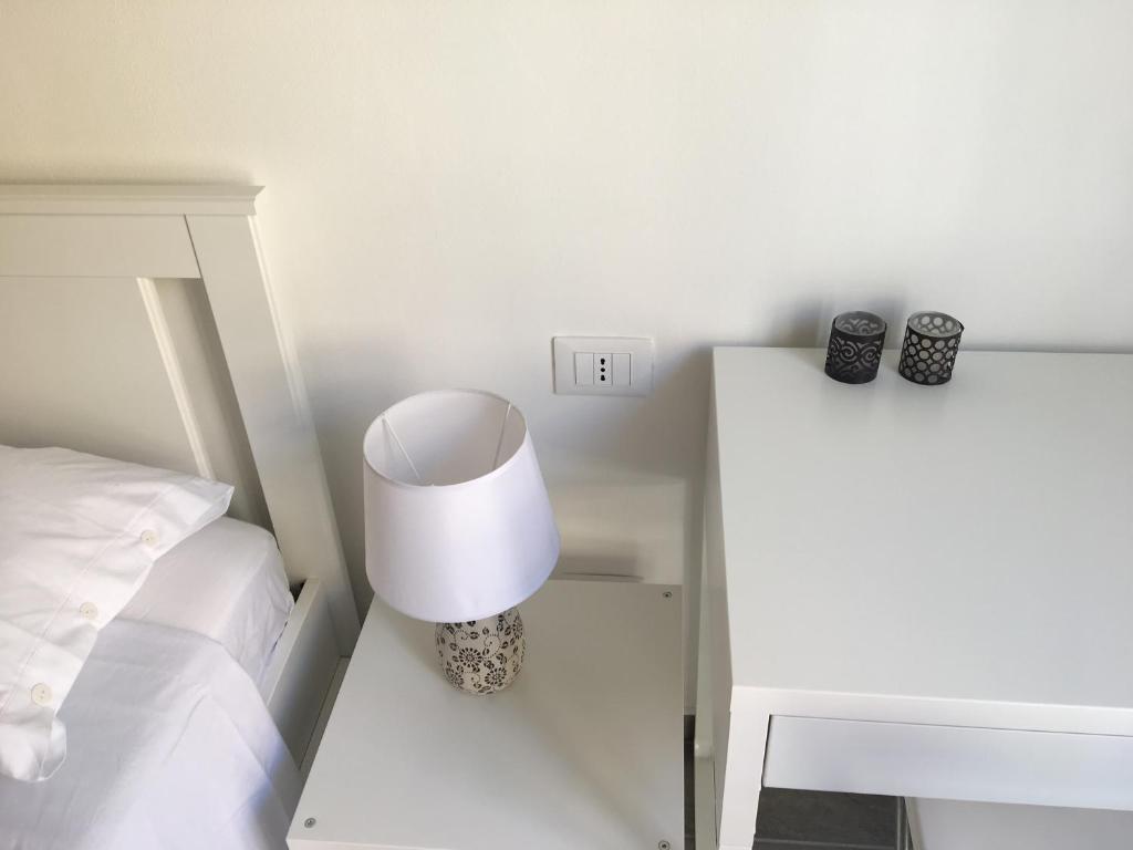 Posteľ alebo postele v izbe v ubytovaní FraLePorte