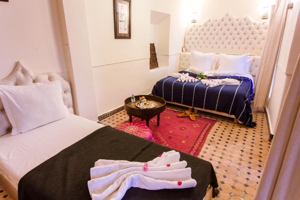 Postel nebo postele na pokoji v ubytování Riad Chams Marrakech
