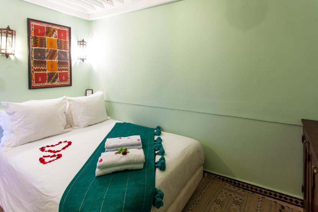 Postel nebo postele na pokoji v ubytování Riad Chams Marrakech