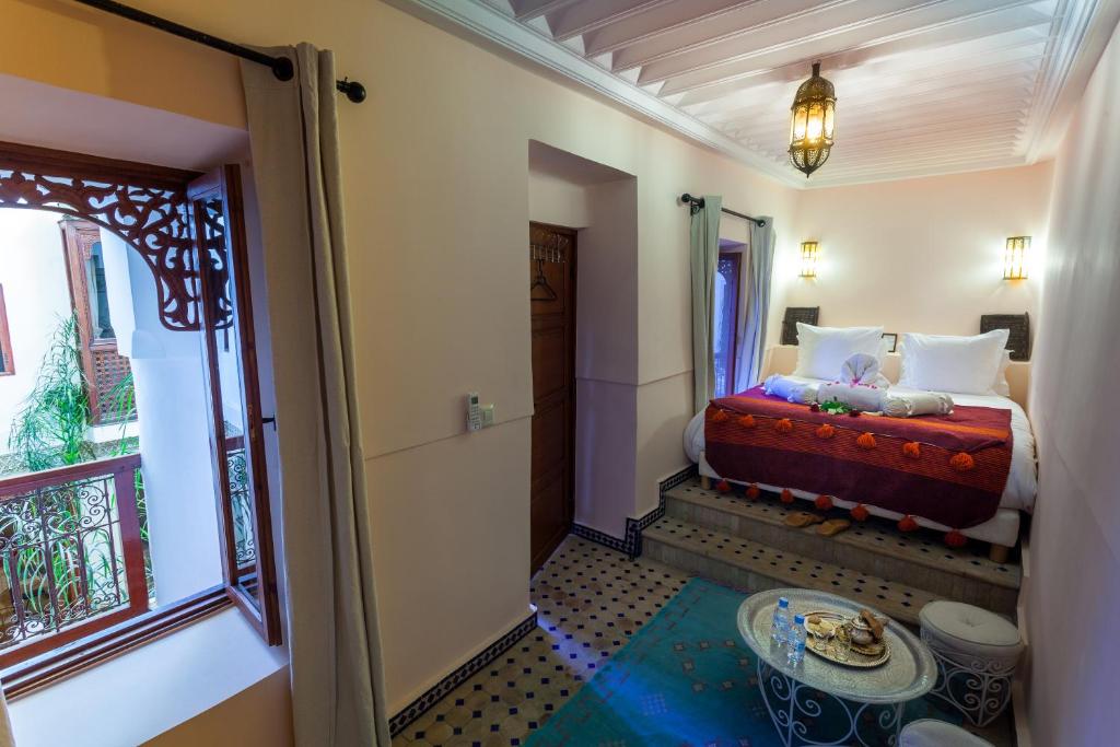 Postel nebo postele na pokoji v ubytování Riad Chams Marrakech
