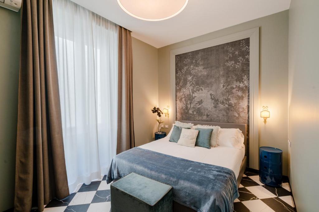 Postel nebo postele na pokoji v ubytování Deseo Home