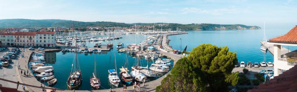 a harbor filled with lots of boats in the water at Hotel Marina in Izola