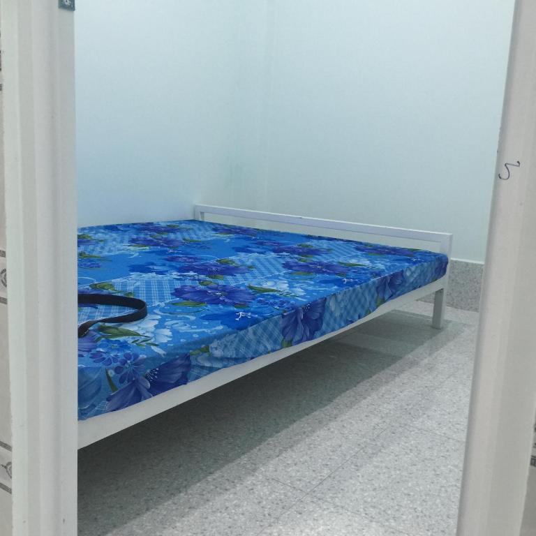 Postel nebo postele na pokoji v ubytování HOMESTAY Cát Tiên