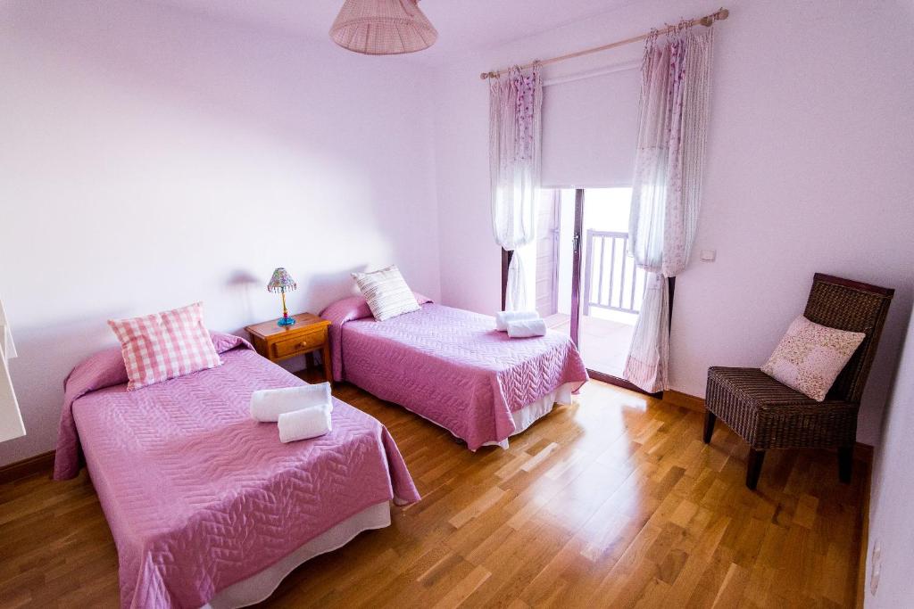 Postel nebo postele na pokoji v ubytování Villa Carmen Lanzarote