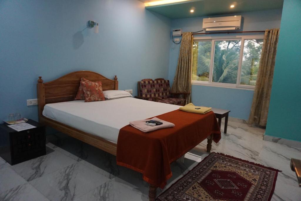 Uma cama ou camas num quarto em The Seaview Residency