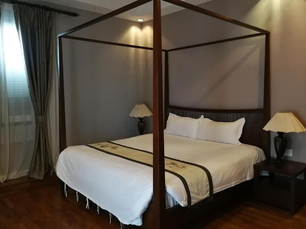 Postel nebo postele na pokoji v ubytování Jonker Boutique Hotel