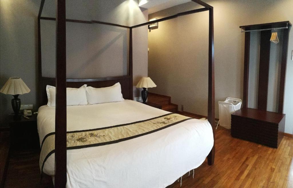 Postel nebo postele na pokoji v ubytování Jonker Boutique Hotel