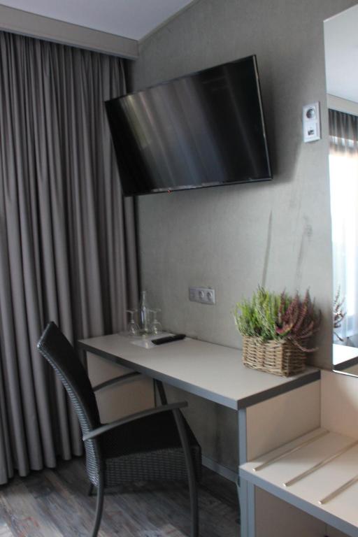 TV a/nebo společenská místnost v ubytování Hotel Eulensteins