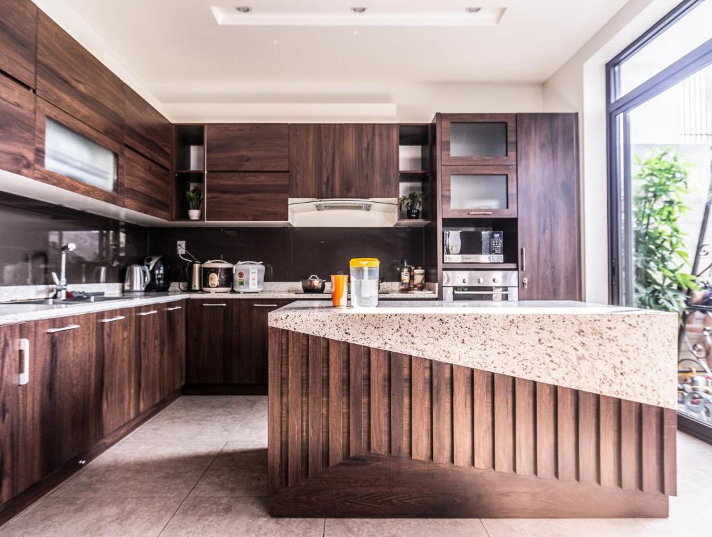 Kuchyň nebo kuchyňský kout v ubytování Homestay Villa Full House