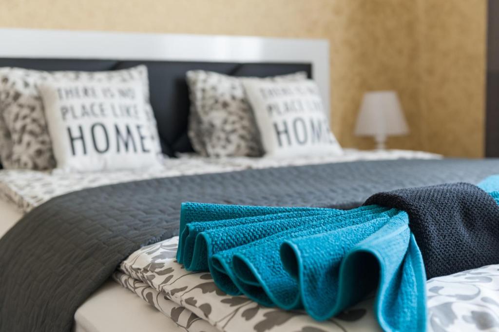 Postel nebo postele na pokoji v ubytování Vitosha Blvd - 2BR LUX APART
