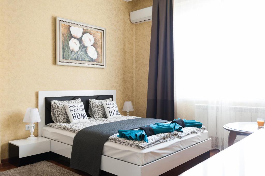 Postel nebo postele na pokoji v ubytování Vitosha Blvd - 2BR LUX APART