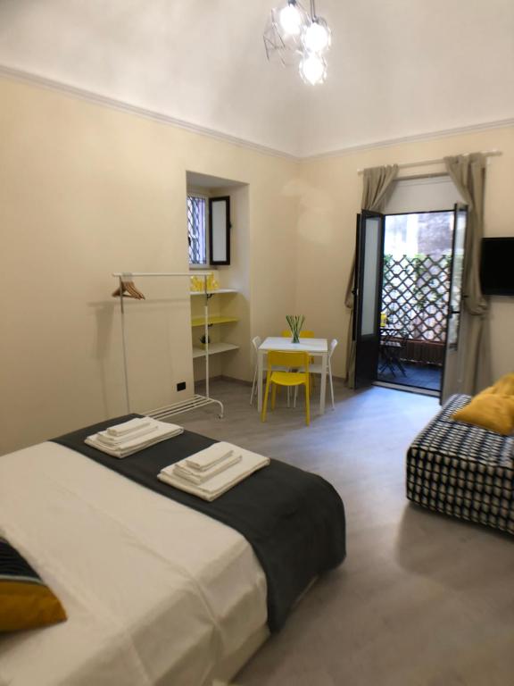 A bed or beds in a room at Catania Sun&Sea - Sun Home