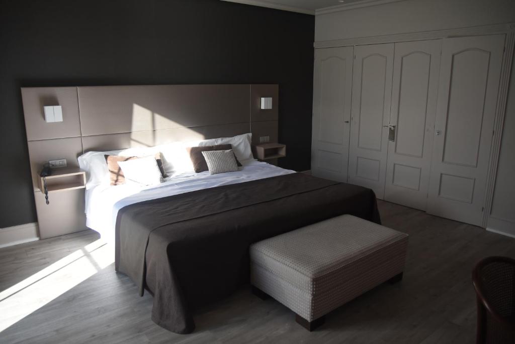 Postel nebo postele na pokoji v ubytování Hotel Igeretxe