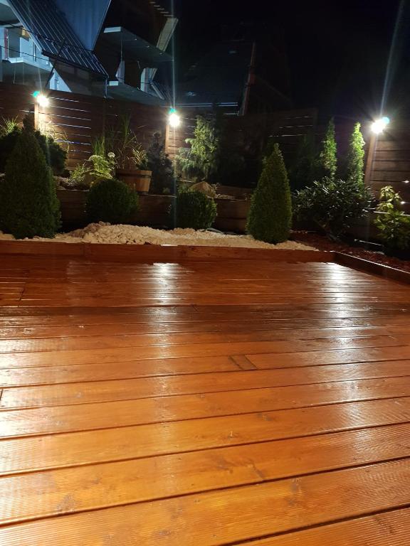 Vonkajšia záhrada v ubytovaní VIP Apartamenty POD KROKWIĄ SPA