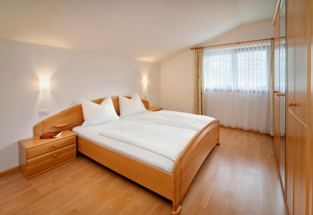 Postel nebo postele na pokoji v ubytování Sonnenhof