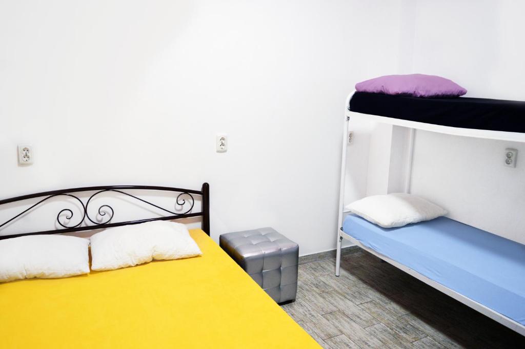 Postel nebo postele na pokoji v ubytování Hostel Vokzal