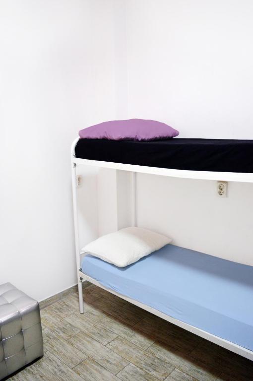 Postel nebo postele na pokoji v ubytování Hostel Vokzal