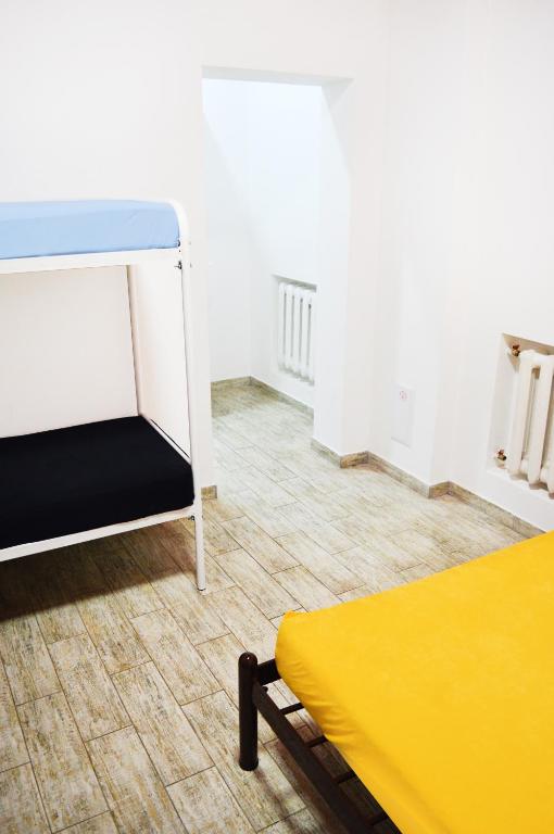 Postel nebo postele na pokoji v ubytování Hostel Vokzal