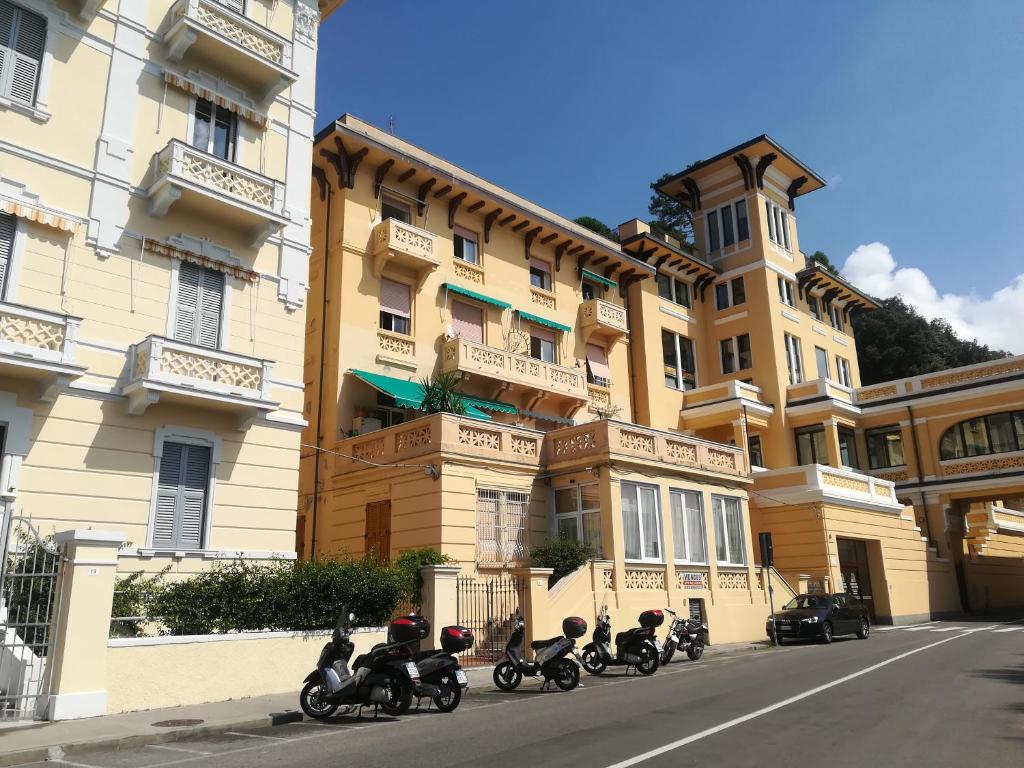 a group of motorcycles parked in front of a building at Il faro dei poeti in Lerici