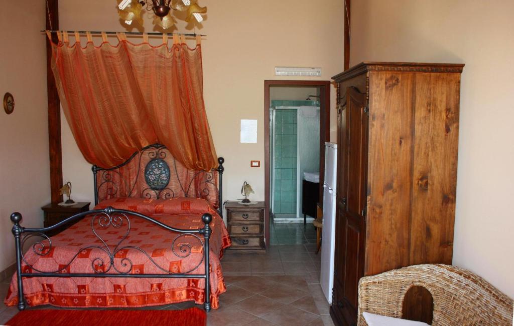 Posteľ alebo postele v izbe v ubytovaní Agriturismo Ghiritina
